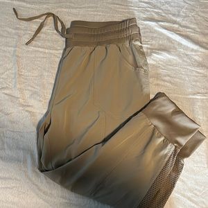 3/$40 Beige, cropped athletic pant with mesh detail